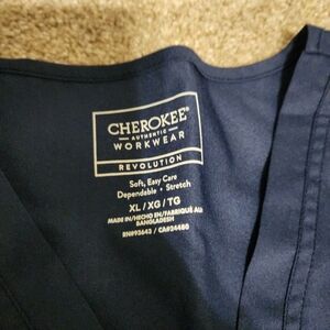 Cherokee womens scrub top size XL  Navy blue.  never worn